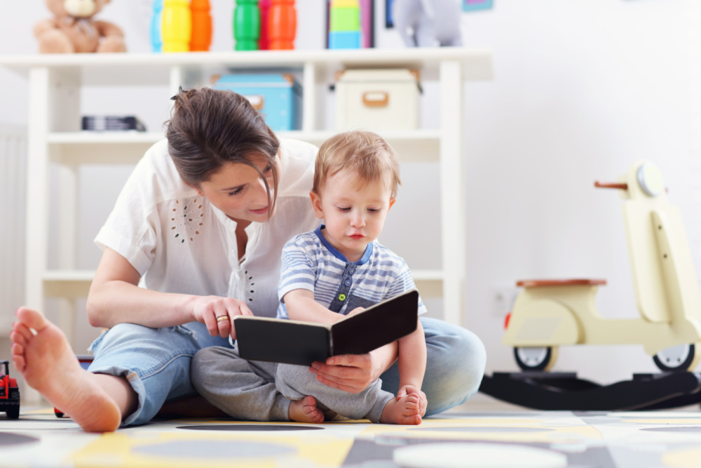 mom reading toddler books