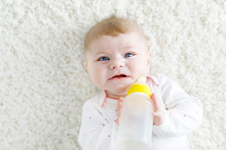 unhappy baby refusing bottle