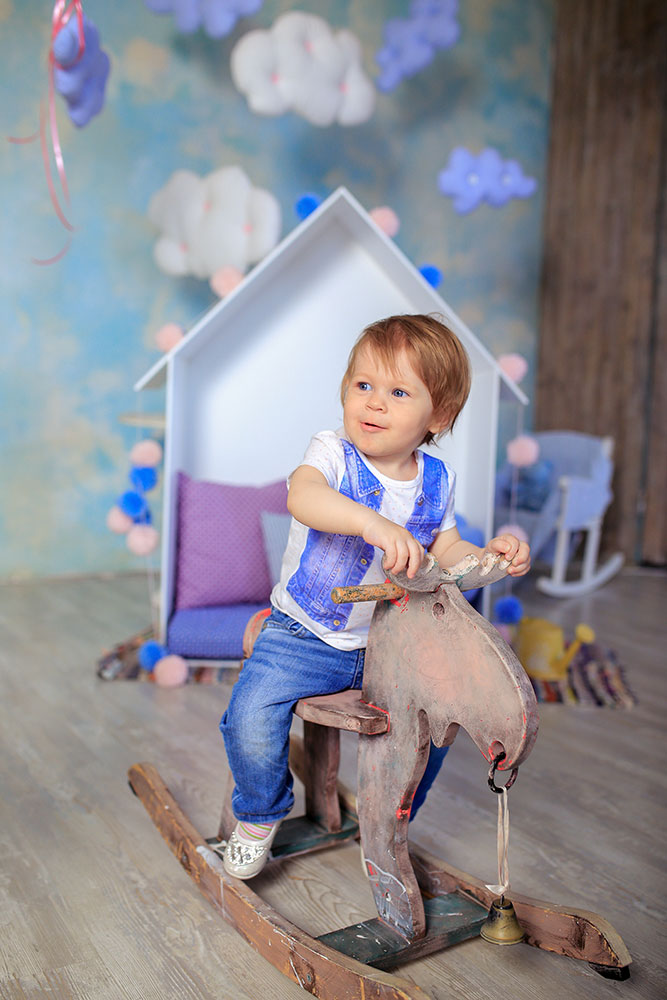 Toddler on rocking horse