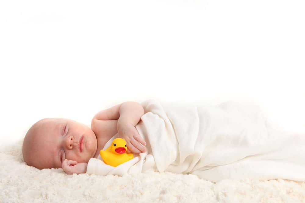 baby dropping the swaddle