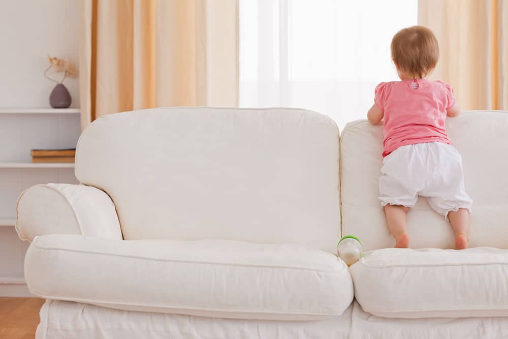 baby number 3 on a couch