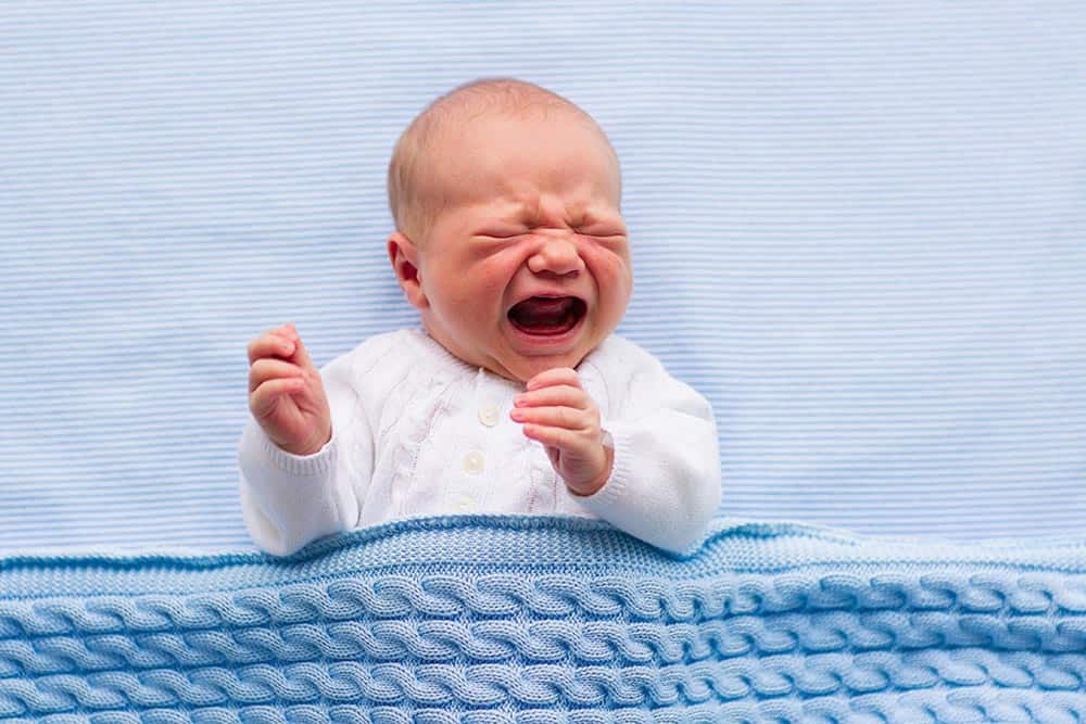 baby crying newborn fights sleep