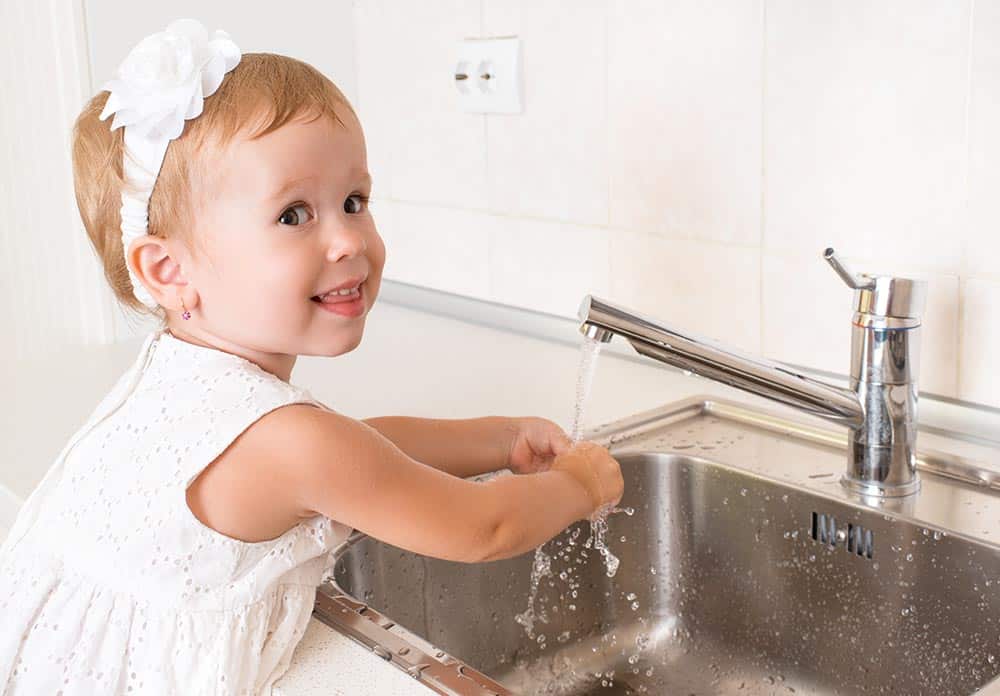 toddler washing hands