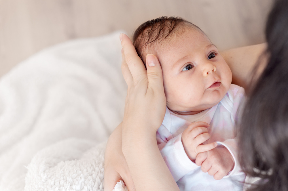 what to expect with a newborn week by week looking at mom