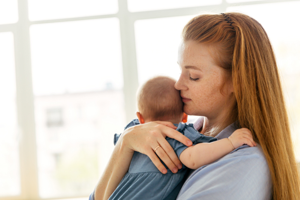 mom struggling with postpartum loneliness