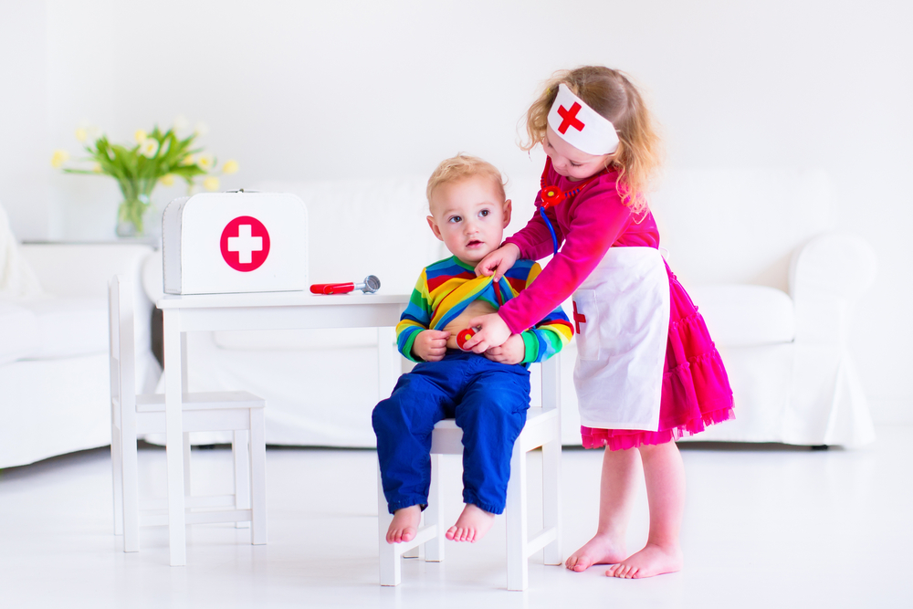 toddler playing dress ups