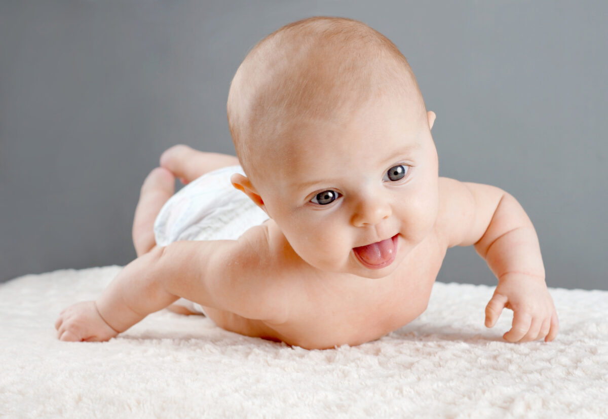baby rolling on belly