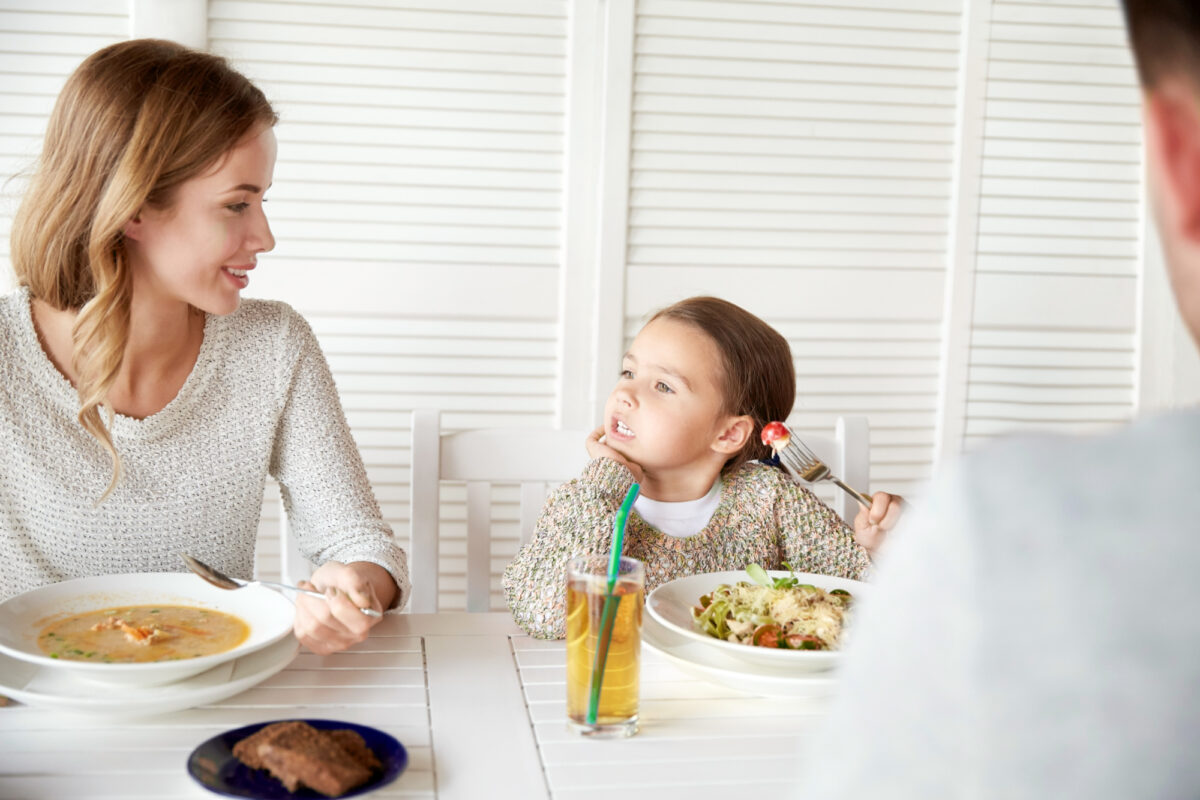 family talking at dinner