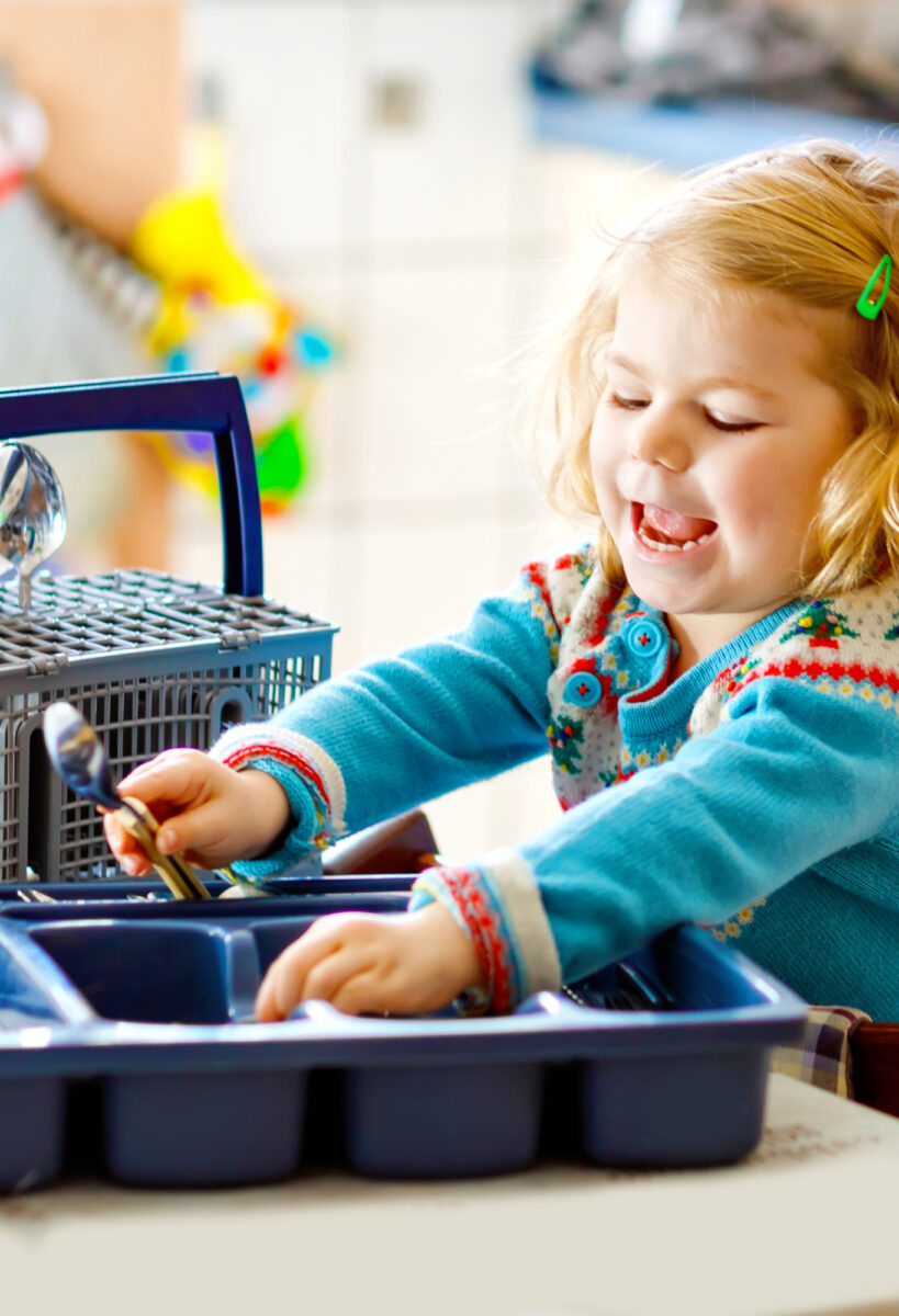toddler sorting cutlery