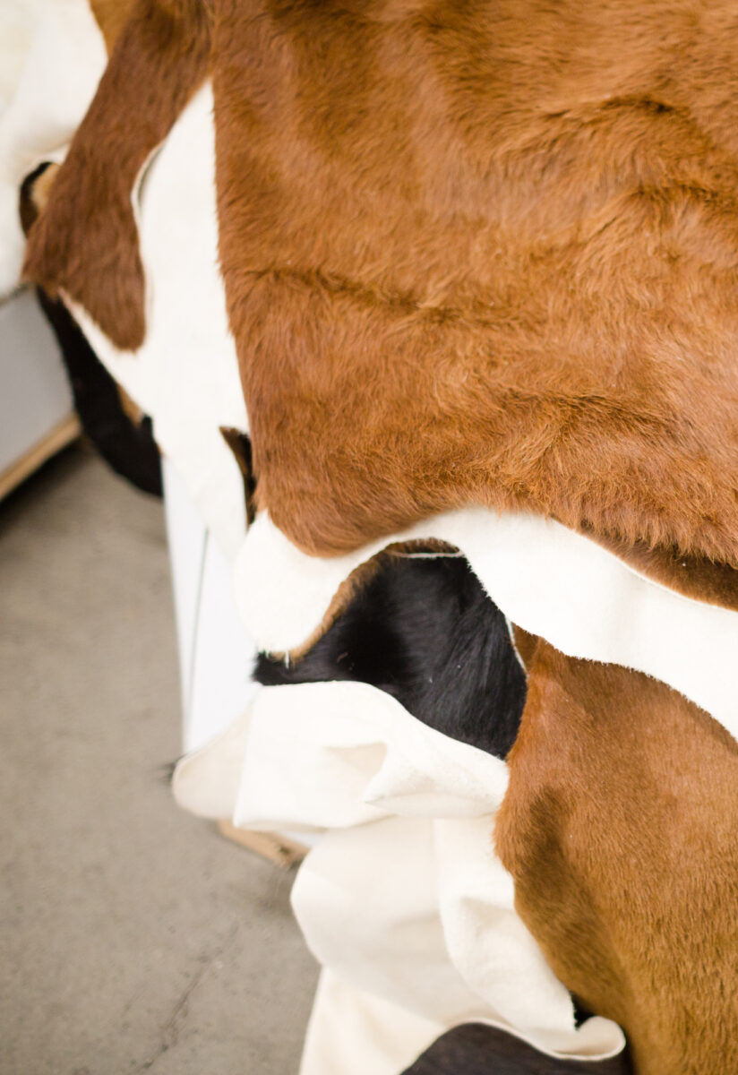 pile of cowhide rugs