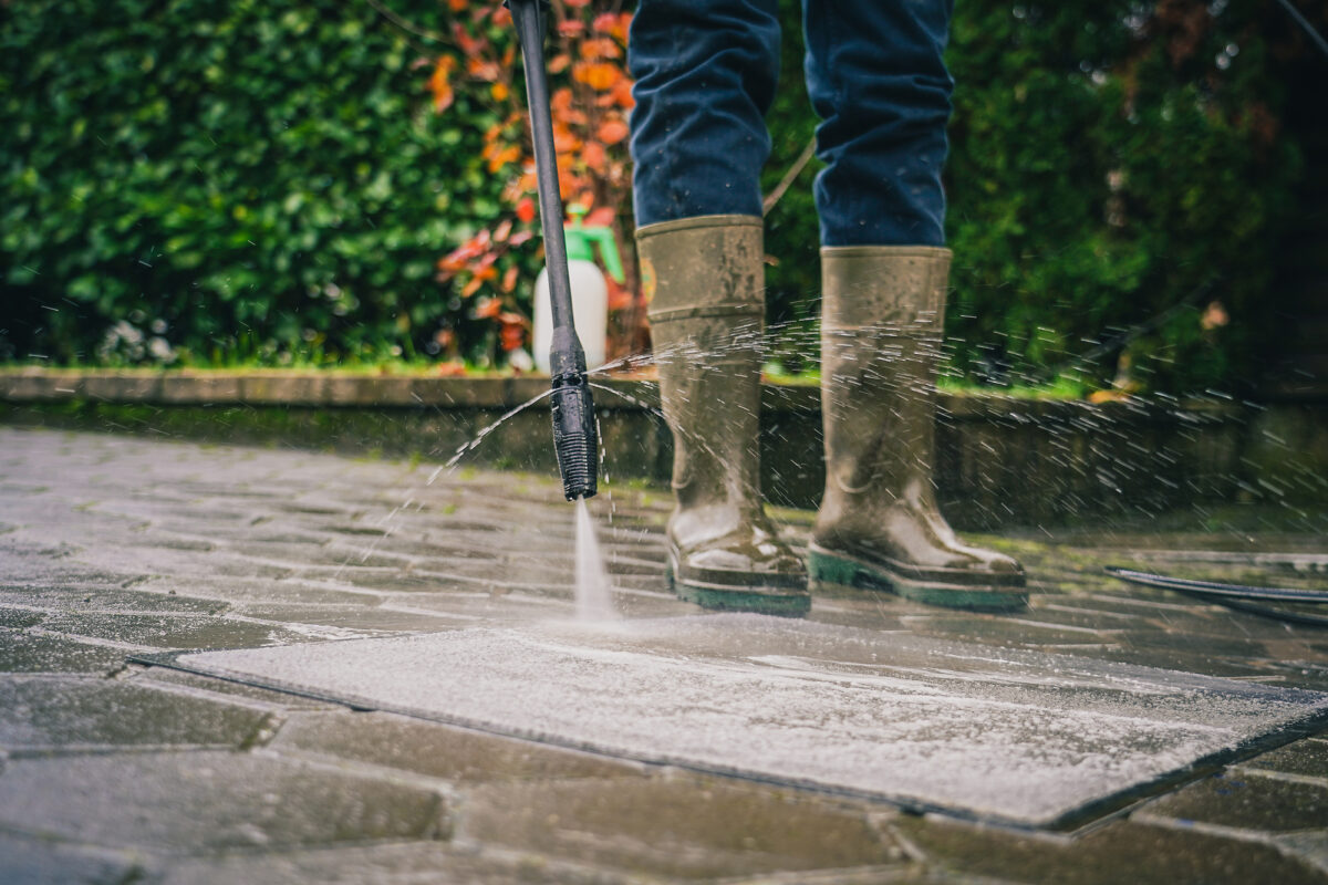 cleaning an area rug with a pressure washer