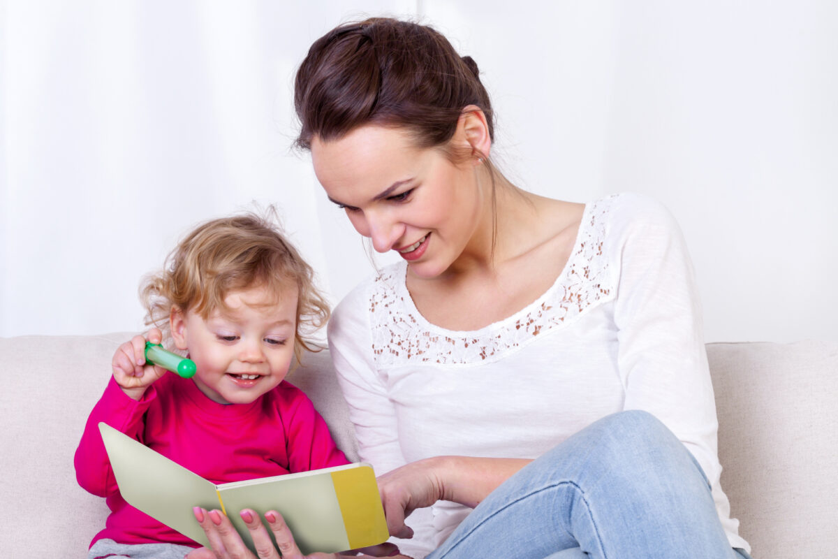 mom reading to toddler