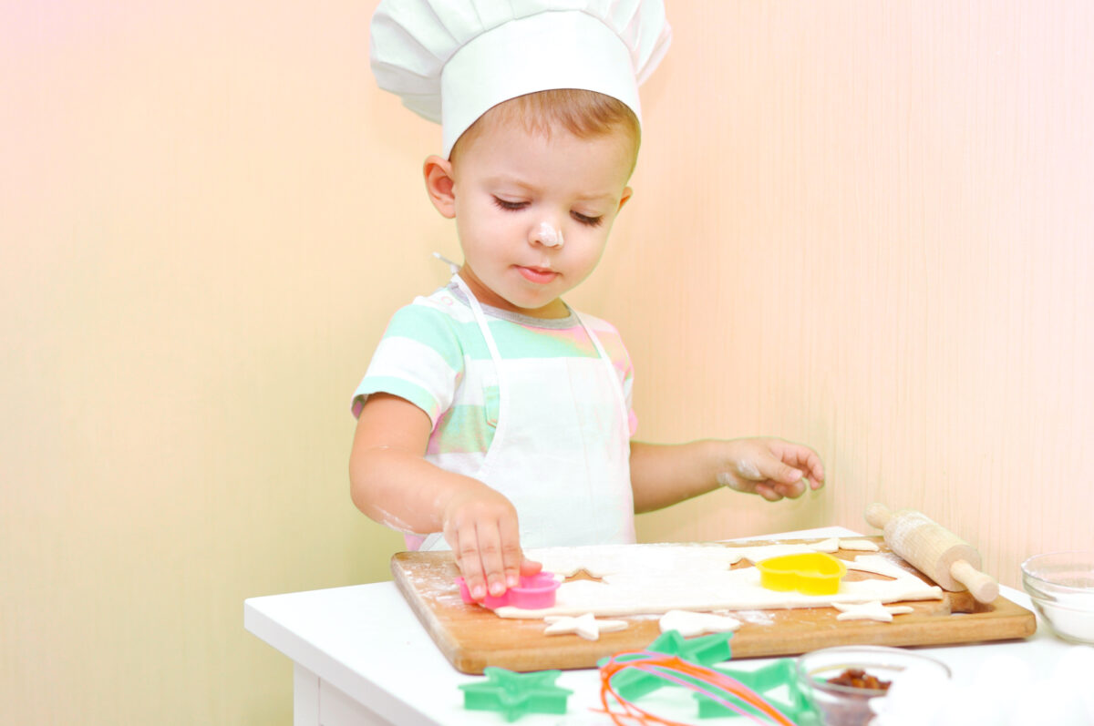 Toddler dressed as chef