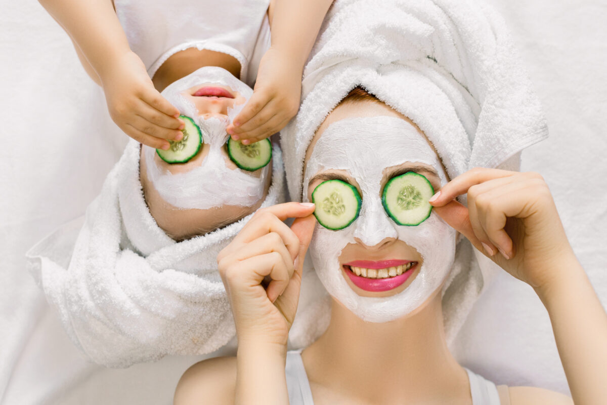 Parent and child having spa day