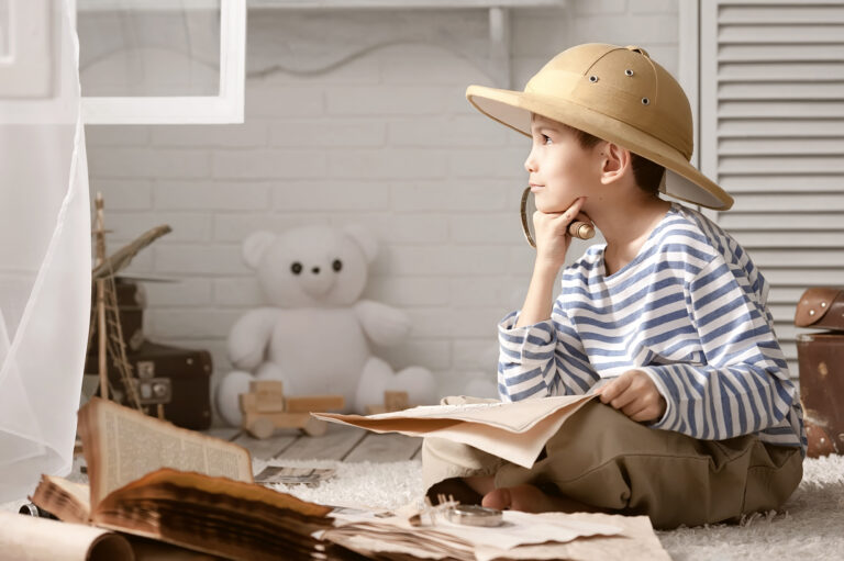 young boy learning how to make history fun in homeschool