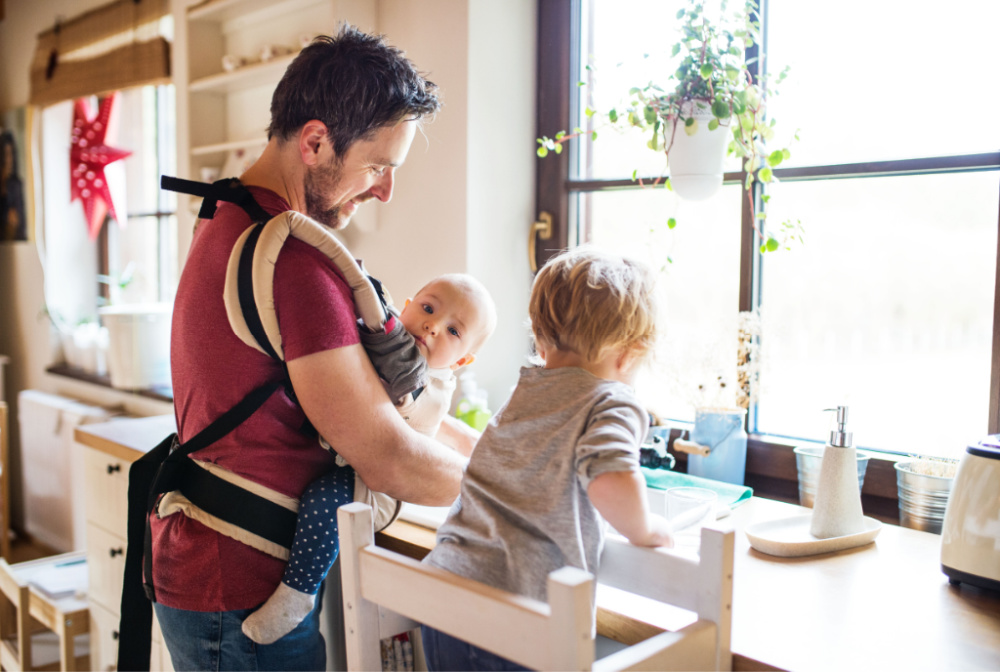 dad helping with kids two under two