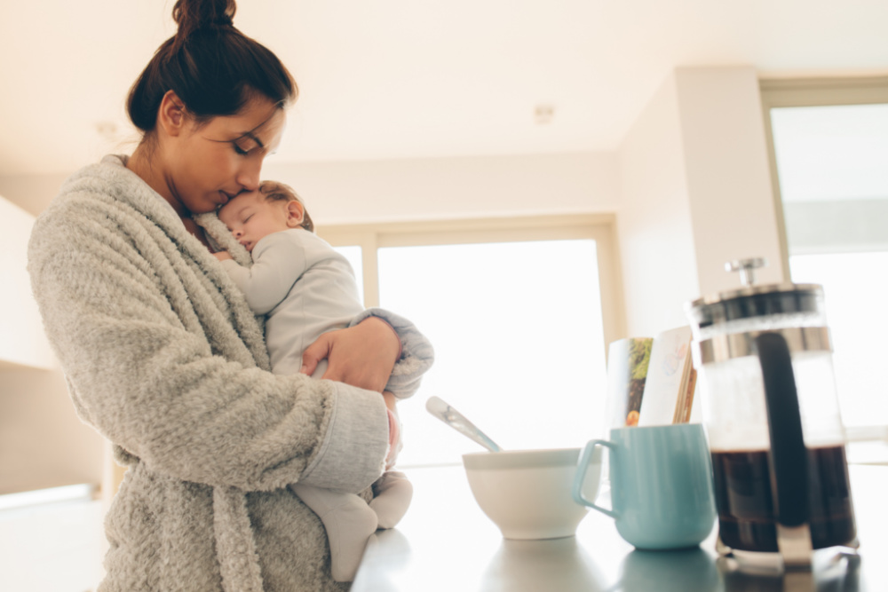 mom holding newborn