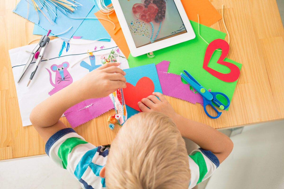 preschooler using scissors