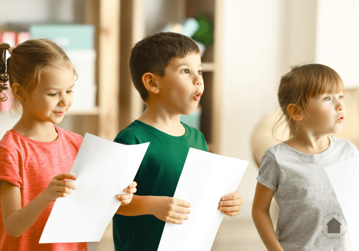 kids putting on christmas show at home
