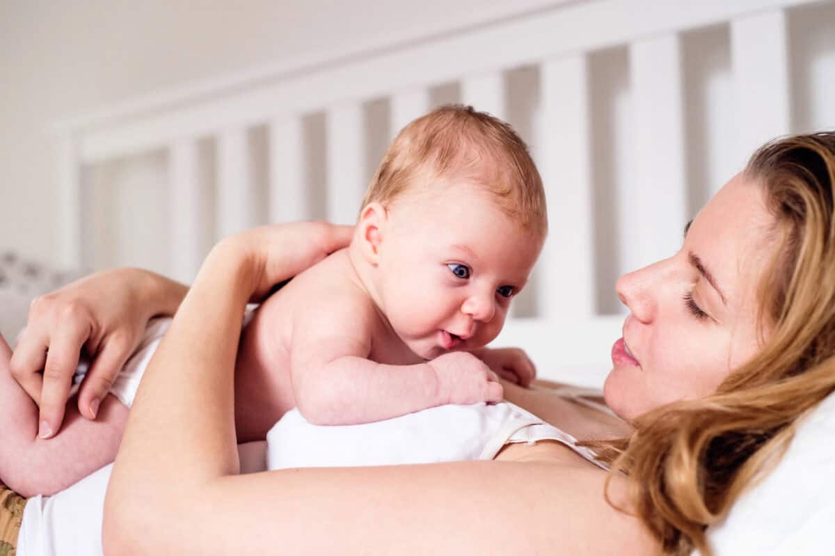 baby doing tummy time on mom