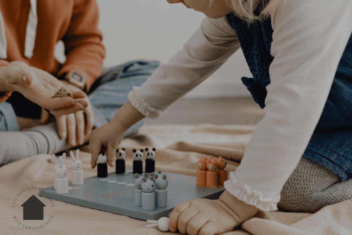 children playing a board game together