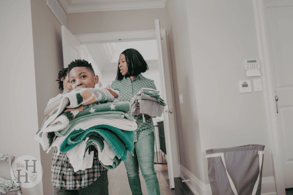 mom and kids cleaning house
