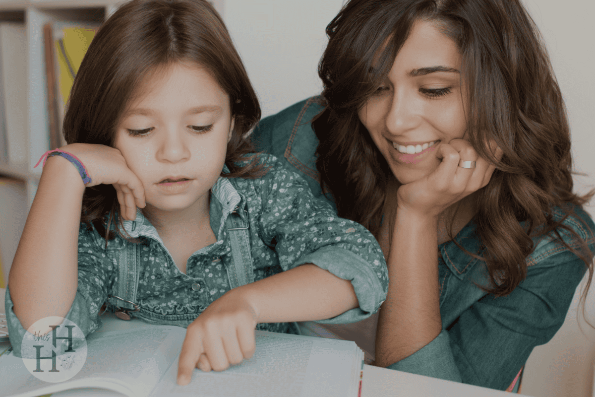 mom homeschooling daughter