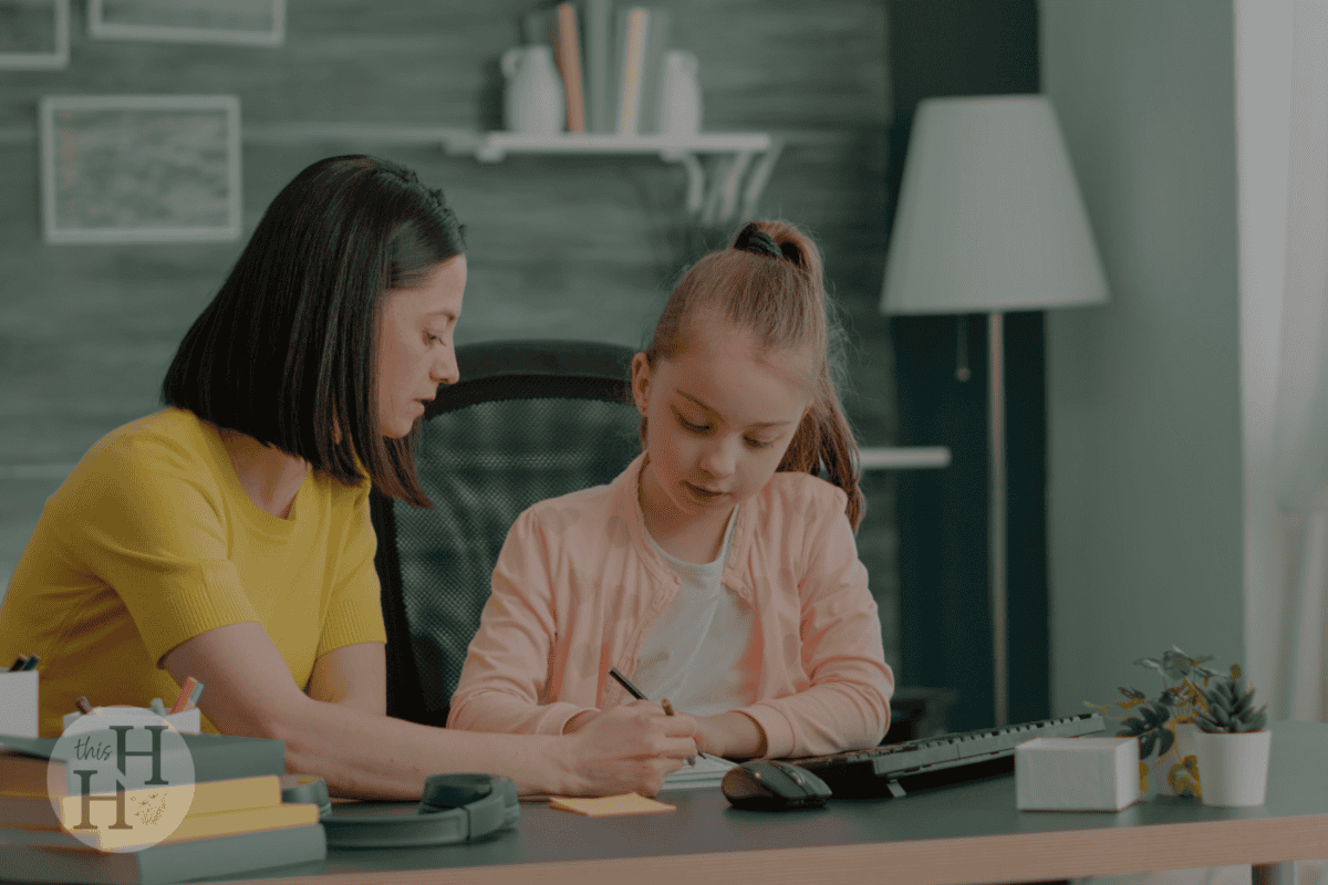 mom and child homeschooling together