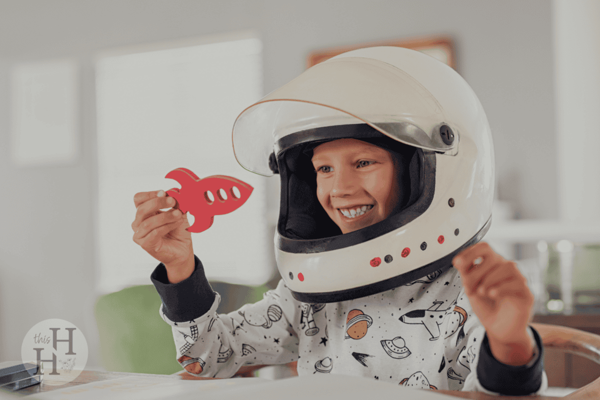 child playing astronaut