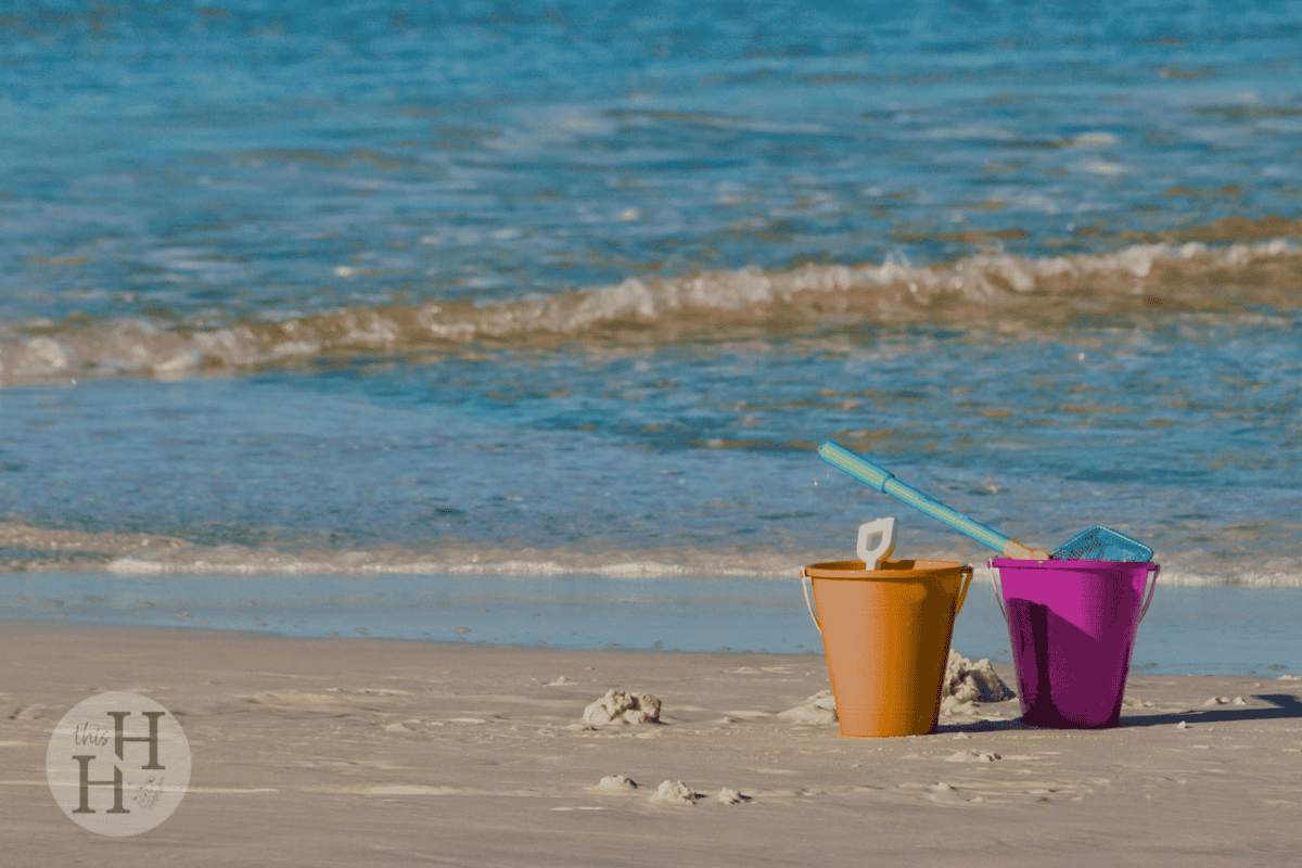 two buckets at the beach