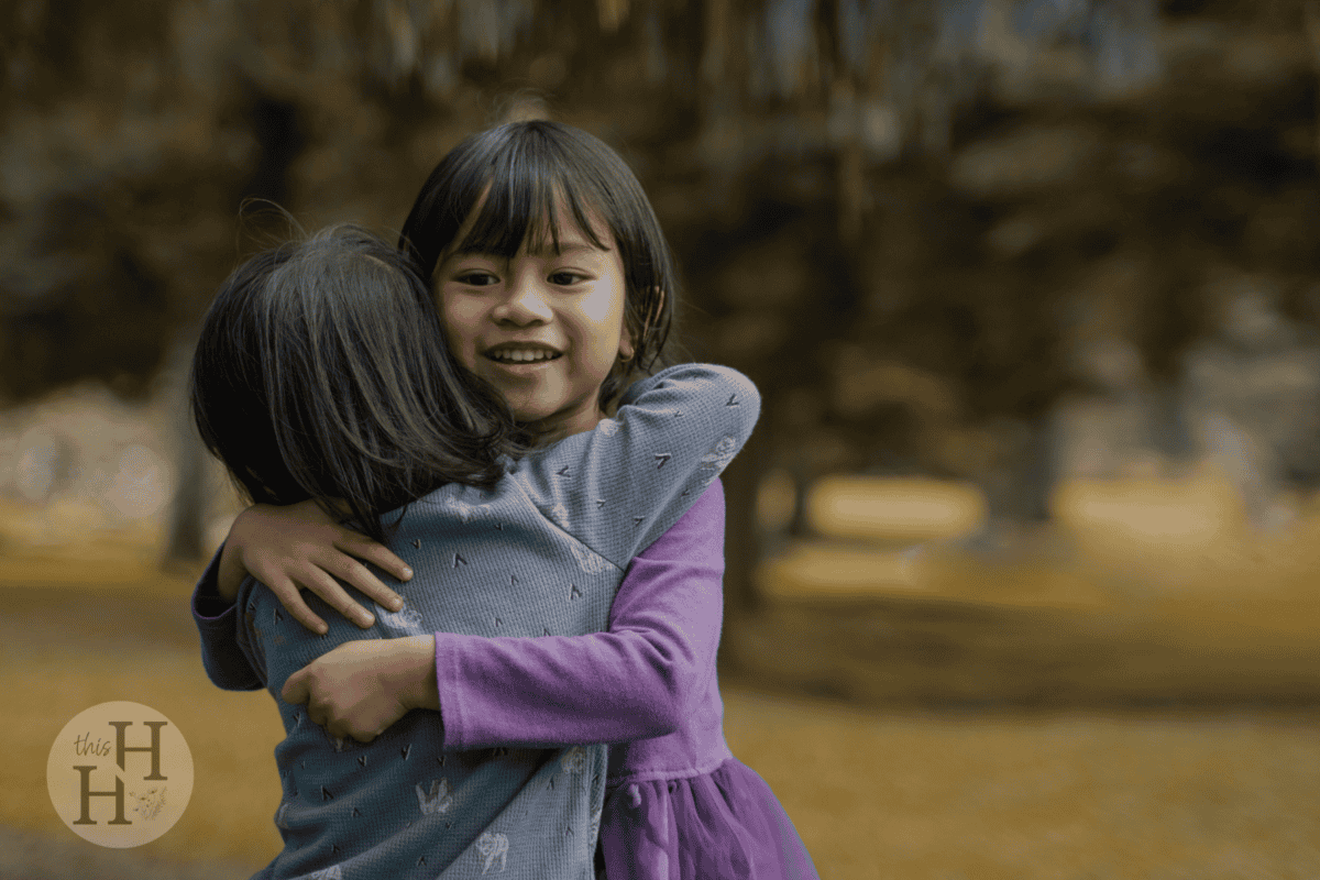 two girls hugging