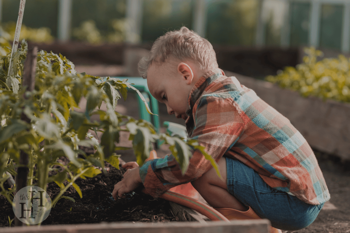 child working in garden