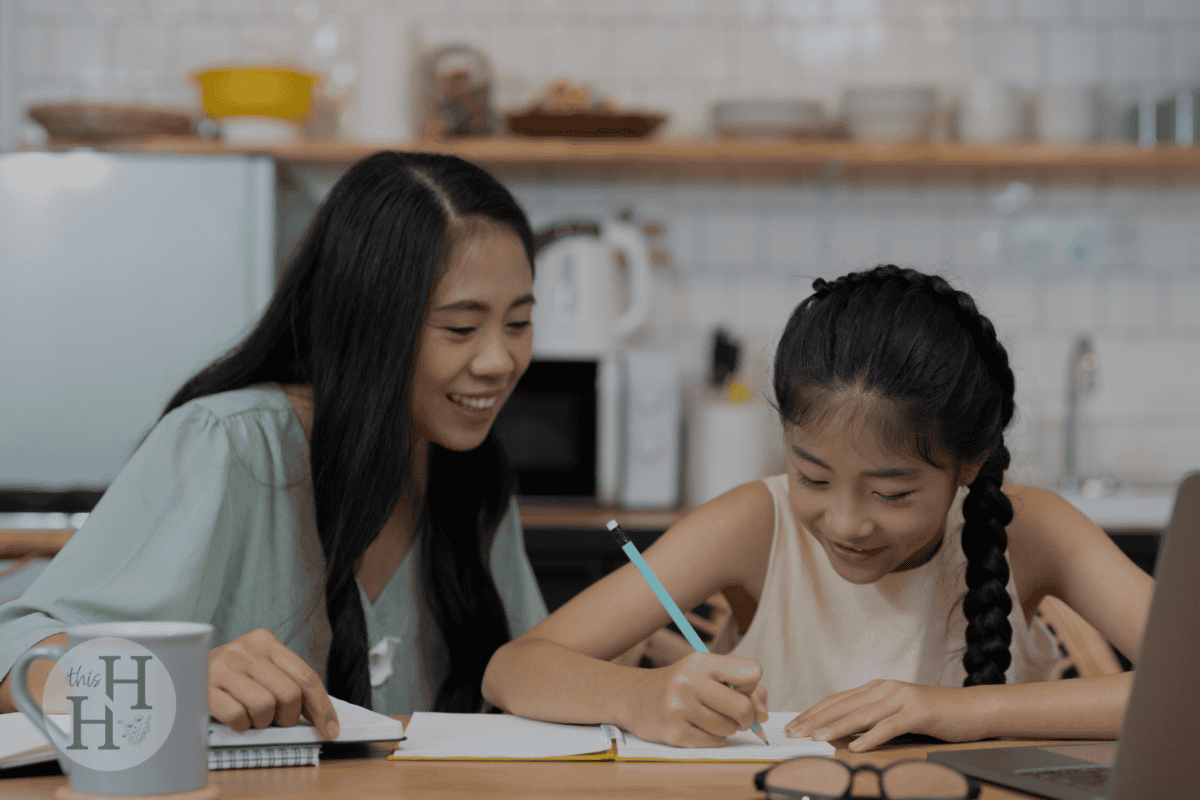 mom homeschooling child