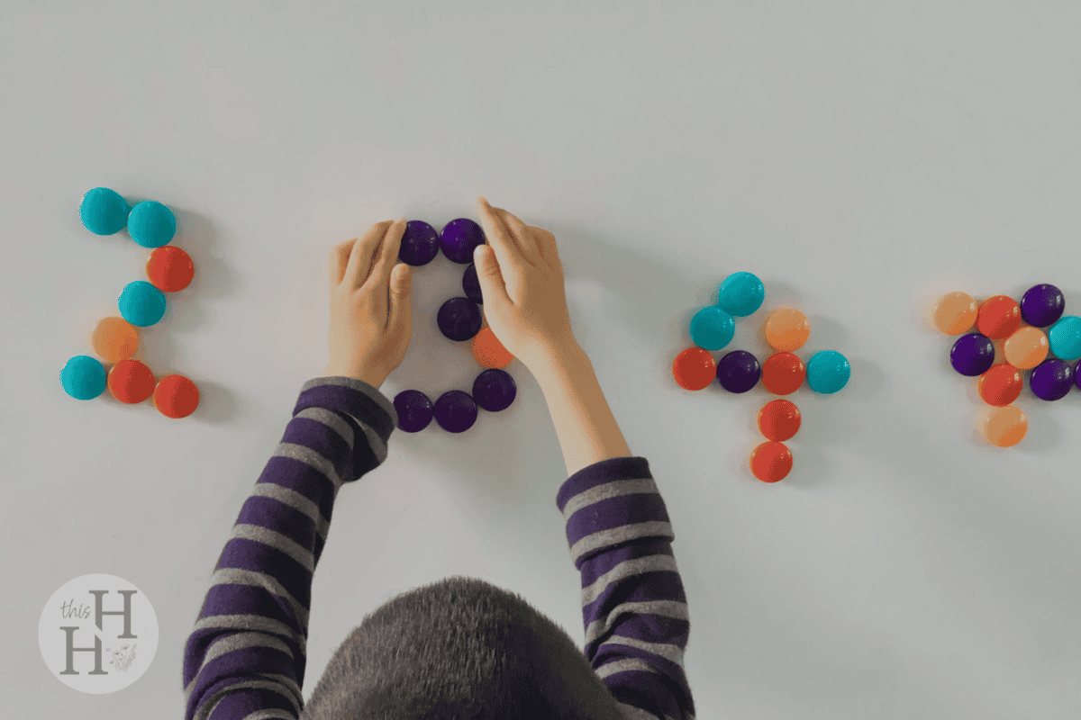 child using manipulatives