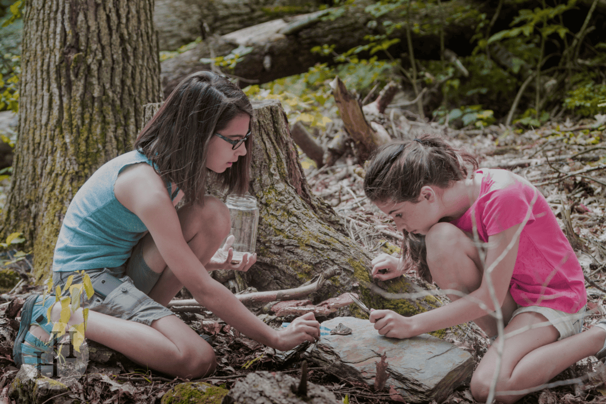girls studying nature