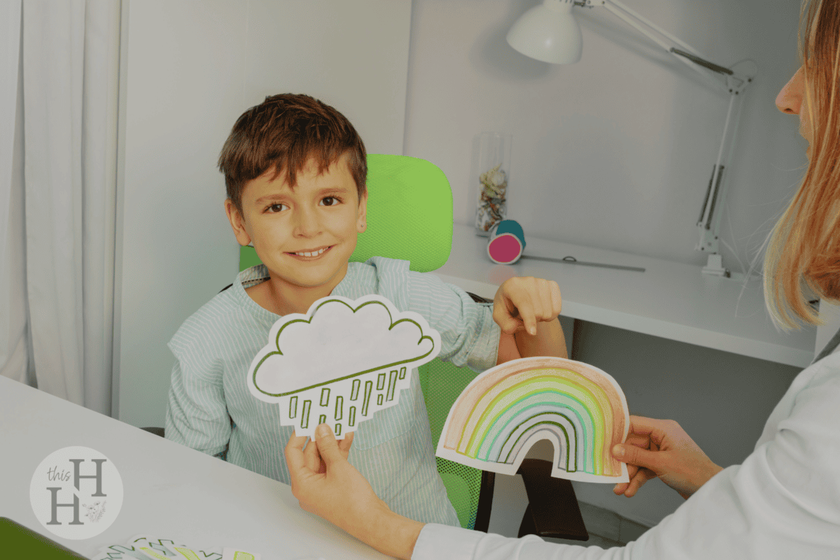 young boy having lesson in weather