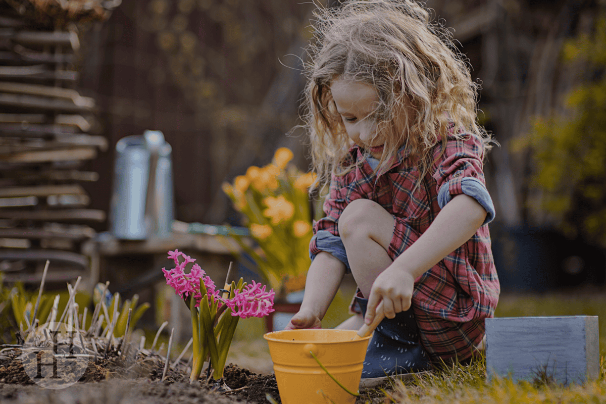 little girl gardening