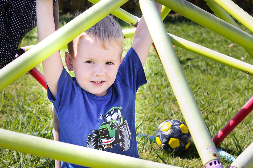 Child on playground equipment